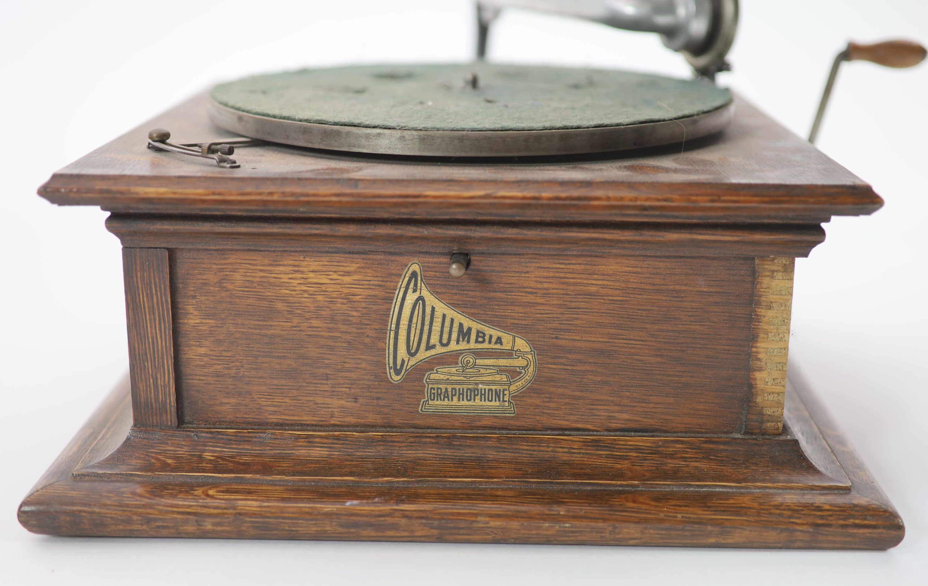 An Edwardian oak cased Columbia gramophone 70cm high.